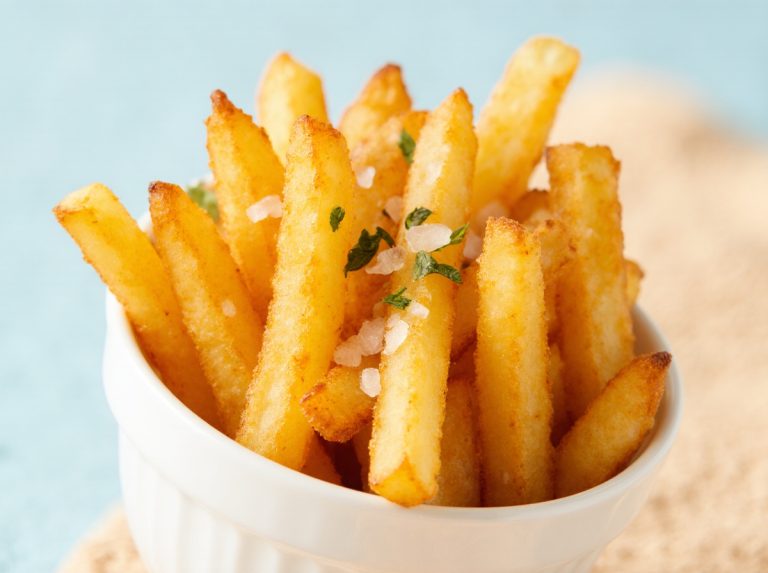 Crispy air fryer frozen french fries perfectly cooked for a delicious side dish.